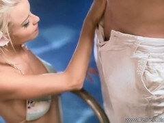 Poolside blowjob from stunning blonde in bikini leaves everyone amazed