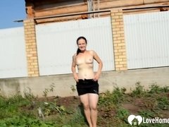 Provocative outdoor action with a very busty raunchy mature