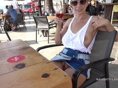 MILF exhibitionist flashing pussy and boobs outdoors in Spain