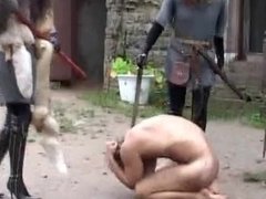 Medieval slave spitted kicked & smeared out outdoors by three femdom