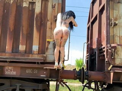 Dancing nude Outdoor among old trains
