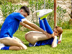 Soccer players fuck on the pitch during sensual outdoor gay romance