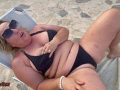Wild wife Lena has an intense squirting solo session on the camp sofa in the great outdoors