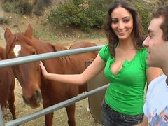 Splendid bitch in green top gives boy toy blowjob at a horse farm