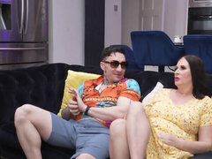 BBW brunette MILF in a yellow dress sucks cock on the couch