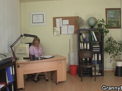 Watch this busty office cougar in stockings give in to her lustful desires and ride his massive dick
