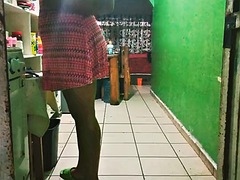 Chubby mexican wife cooking dinner in the kitchen