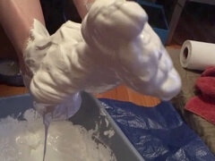 Size 7 feet covered in sticky marshmallow fluff receive a messy facial