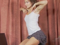 Gorgeous and sensual hairy beauty Morgana strips down to reveal her natural bush