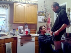 Hot brunette MILF gets banged by toy boy on the kitchen counter while husband's away