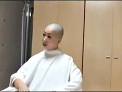 Two Japanese men shaved their heads