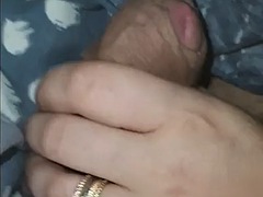 Stepmom perfect handjob under a blanket so her stepson gets a strong erection