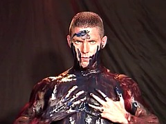 JUNKYARD BOY Dillon Day paints his nude body