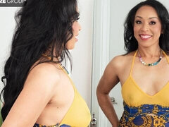 Sweet high-heeled MILF Phoenix Angel is touching her shaved pussy