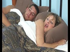 Mature and boy in motel