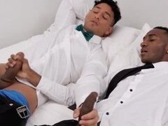 Latino hunk and a tall black fellow riding and sucking