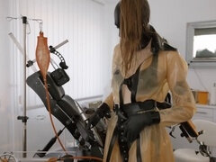 The kinky latex dominatrix gets the clinic ready for a thorough examination
