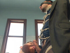 Bound baddie gets his cock jerked in a fun way