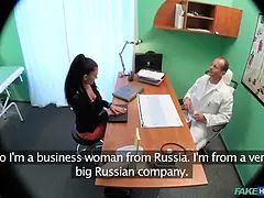 Sales female using a practical demonstration of her bulge lube - faux hospital