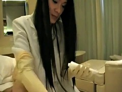 Asian nurse gives a handjob with two different pairs of gloves