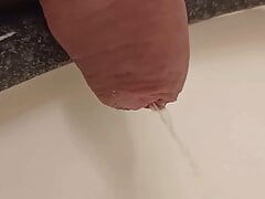 Extreme close up uncut foreskin and pissing