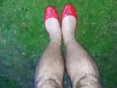 Piss in red ballet flats