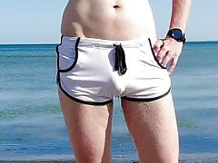 Piss in my swim shorts at the public beach