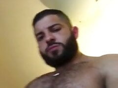 Sexy hairy muscle hunk jerks off.