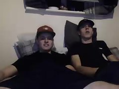 Couple horny lads pop their cocks out