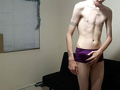 lean femboy disrobes and plays with purple vibrator