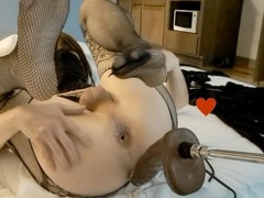 Submissive sissy gets anal penetration from massive black dildo machine