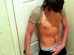 Ollie Lewis wanks Off in restroom