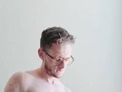 Splendid inked youngster jizzes on the sofa