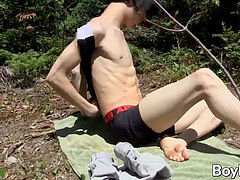 Wilderness inspires young twink to go nude and masturbate