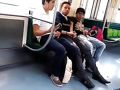 Three young gays in a train