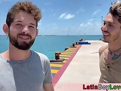 Latin guys celebrate gay pride on the beach outdoor