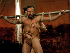 A couple of submissive people are bound and ready to serve