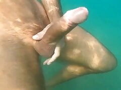 guy jerking off in the water