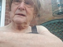 Betty Spanxxx shows off in a short dress during her outdoor solo adventure