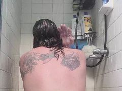 Chubby white guy Neil sucks and fucks dildo in the shower