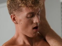 Curly-haired twink gives a blowjob and gets penetrated