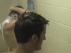 Skinny jocks give each other handjobs in a steamy shower scene