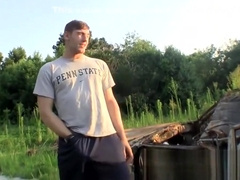 Hung straight stud Elijah Knight enjoys an outdoor jerk off