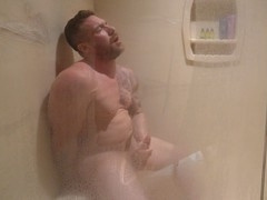 Fit jock takes ass in shower