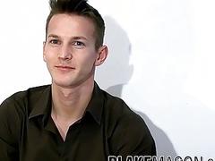 Young man strips to reveal his giant cock before jerking off