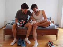 Batty boy buddies toying with soles, socks and footwear