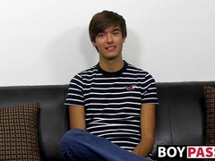 Young dude with bangs pleases himself after the interview