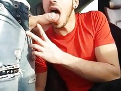 A hot twink gives head from his car