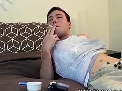 Young stud smokes while jerking off solo