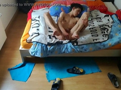 Me toying in couch with a faux-cock